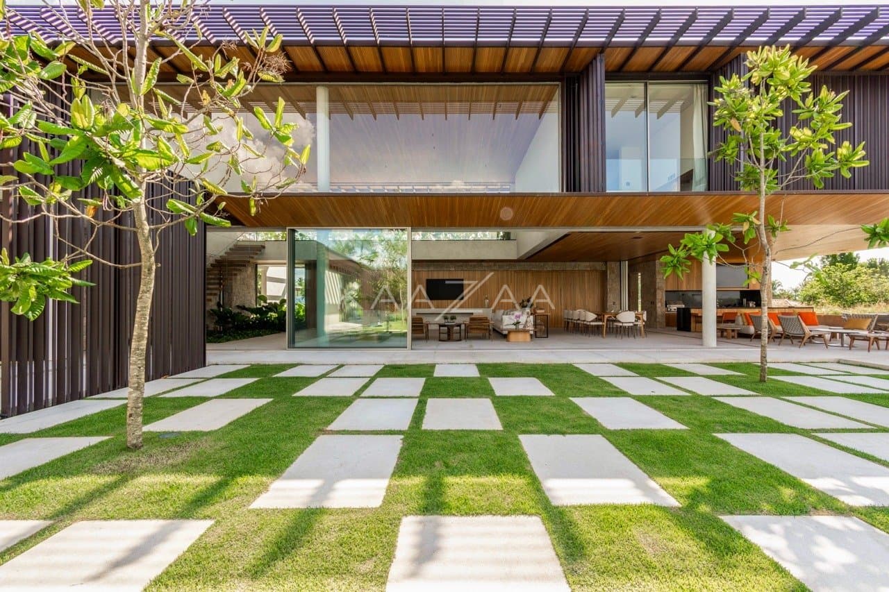 Casa contemporânea feita para interagir com a natureza ao redor. Projeto na Quinta da Baroneza. - Foto 12