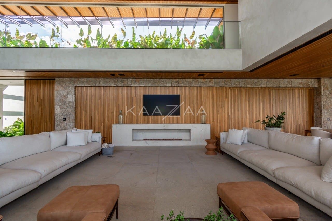 Casa contemporânea feita para interagir com a natureza ao redor. Projeto na Quinta da Baroneza. - Foto 22