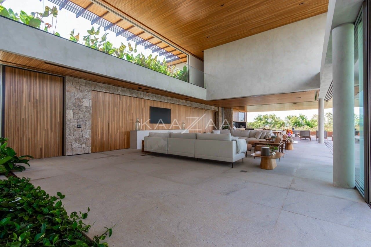 Casa contemporânea feita para interagir com a natureza ao redor. Projeto na Quinta da Baroneza. - Foto 25