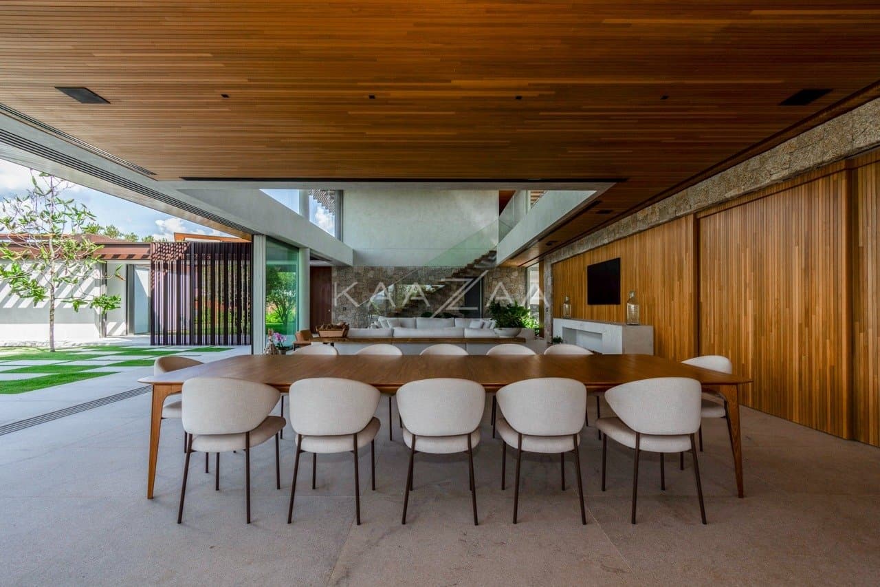Casa contemporânea feita para interagir com a natureza ao redor. Projeto na Quinta da Baroneza. - Foto 30