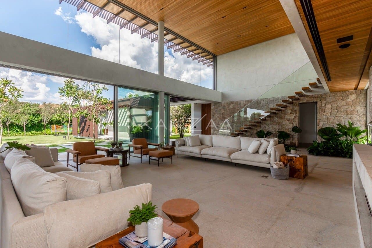 Casa contemporânea feita para interagir com a natureza ao redor. Projeto na Quinta da Baroneza. - Foto 28